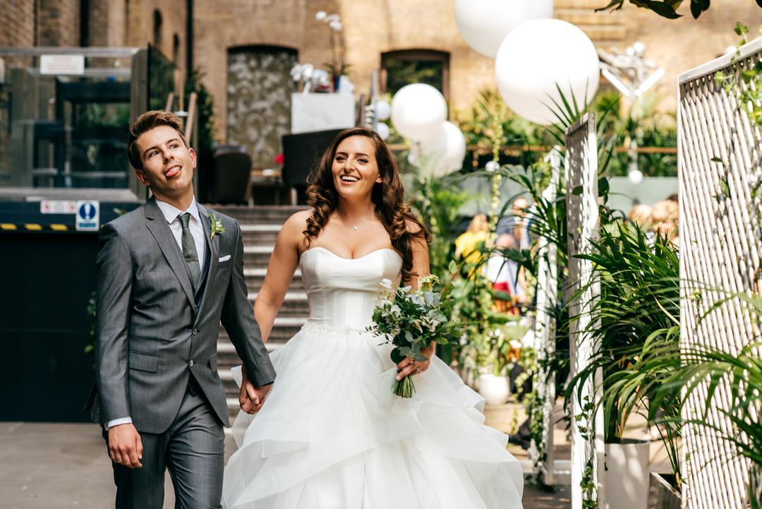 couple-walk-together-just-married-creative-wedding