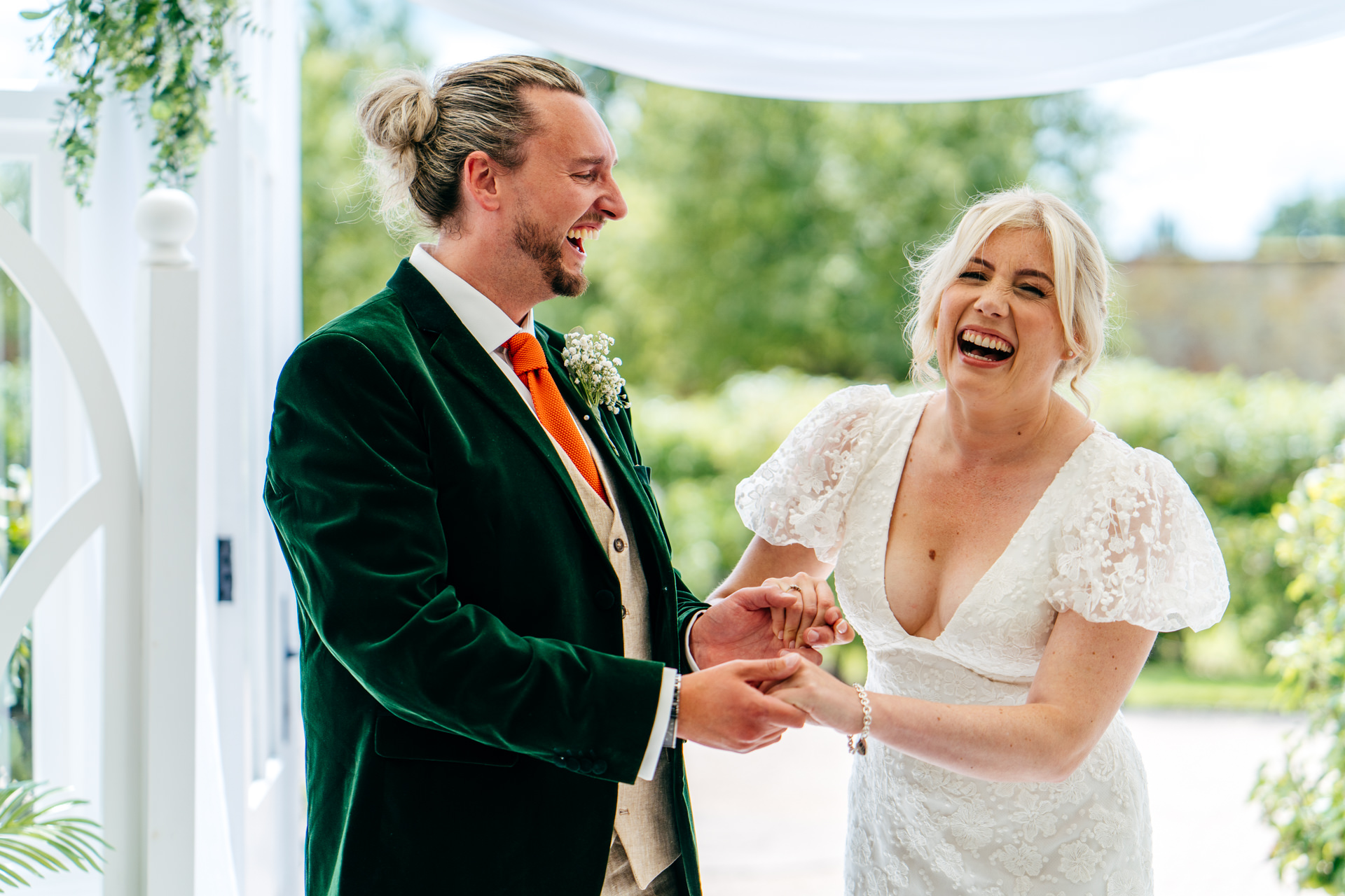 Couple dance with happiness during ceremomy at Combermere Abbey Wedding 