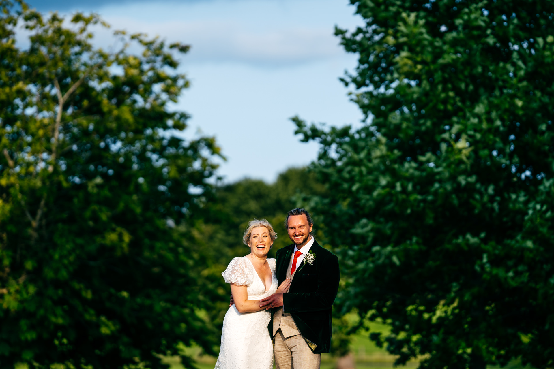 Couple in grounds of Combermere Abbey having their natural and relaxed couple portraits 